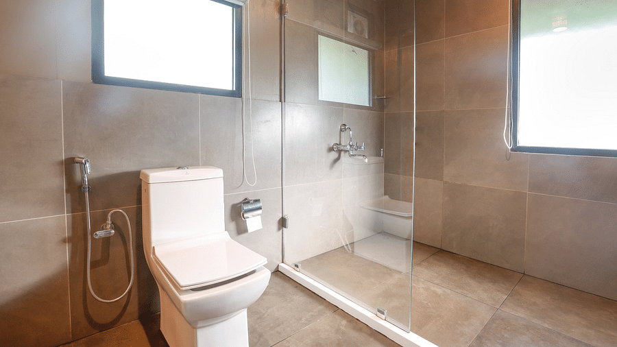 Commode in a bathroom with ventilation | Vythiri Resort. Wayanad